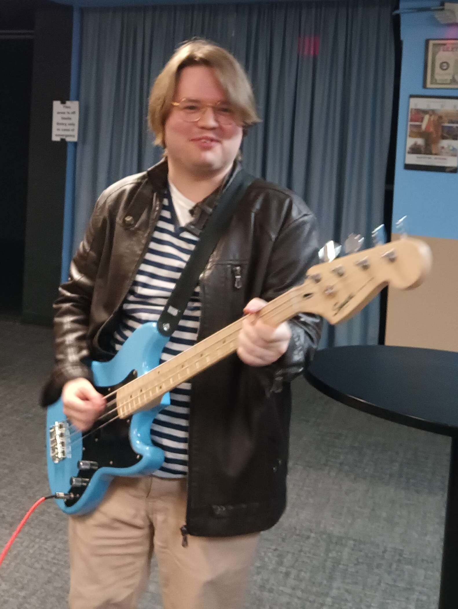 Lesley playing the Squier Bronco Bass backstage @ Expo Arts Center, Long Beach on 10 February 2024